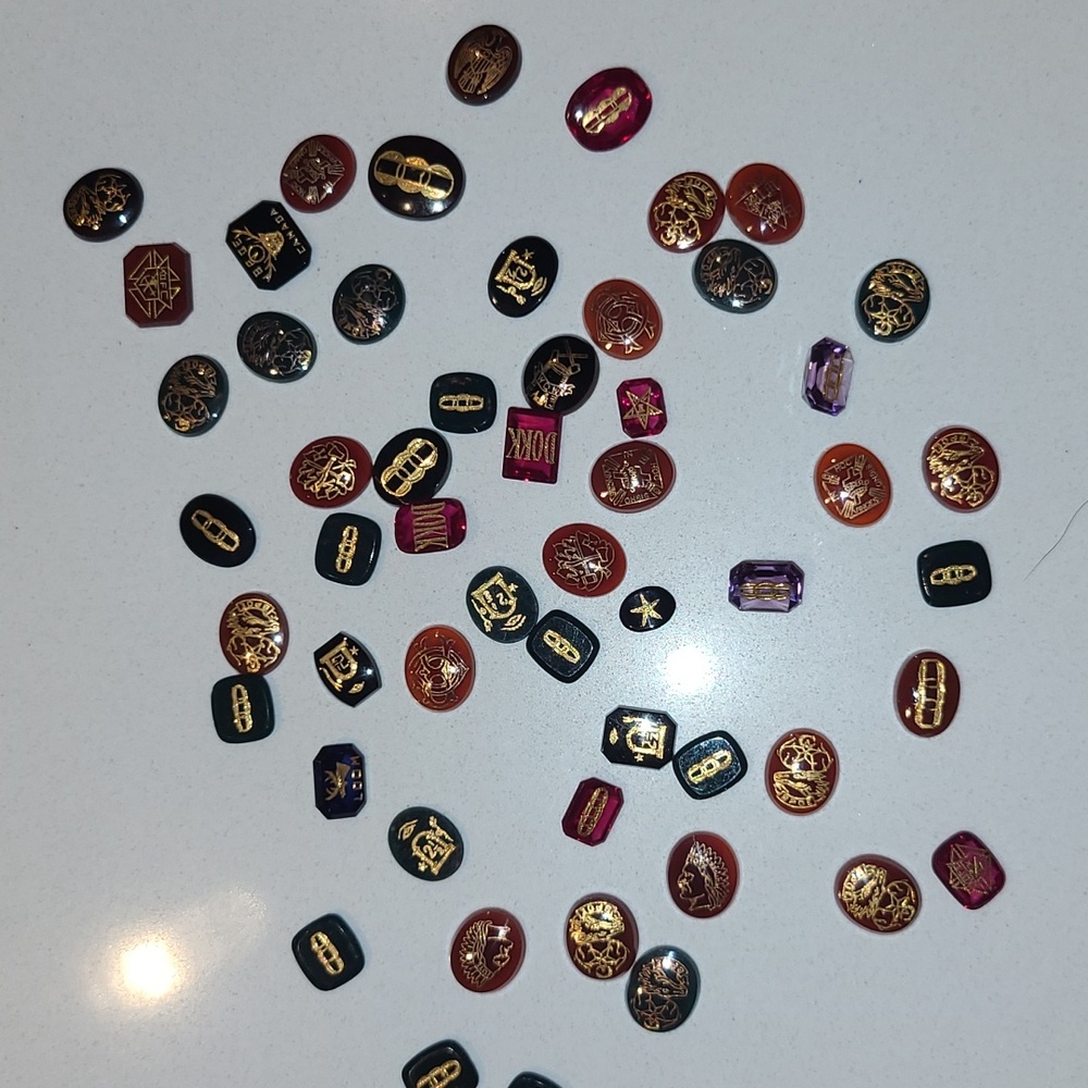 Gold Inlay Emblem Gemstones